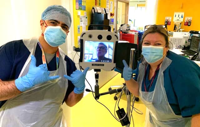 <p>Staff use telemedicine robots at one of Liverpool’s hospitals to virtually consult with a doctor</p>