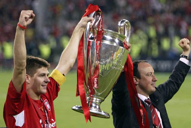 Rafa Benitez, right, lifts the Champions League with Steven Gerrard after Liverpool’s triumph over AC Milan in 2005. Picture: MUSTAFA OZER/AFP via Getty Images