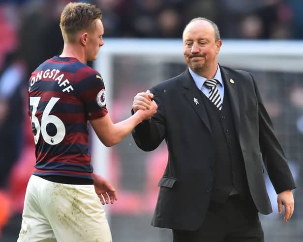 Sean Longstaff embraces with Rafa Benitez during his time at Newcastle boss. Picture: GLYN KIRK/AFP via Getty Images