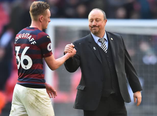 <p>Sean Longstaff embraces with Rafa Benitez during his time at Newcastle boss. Picture: GLYN KIRK/AFP via Getty Images</p>