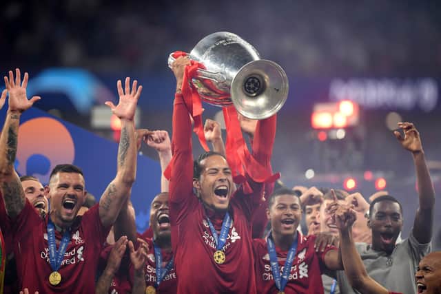 Virgil van Dijk  lifts the Champions League after Liverpool’s defeat of Tottenham in 2019. Picture: Matthias Hangst/Getty Images