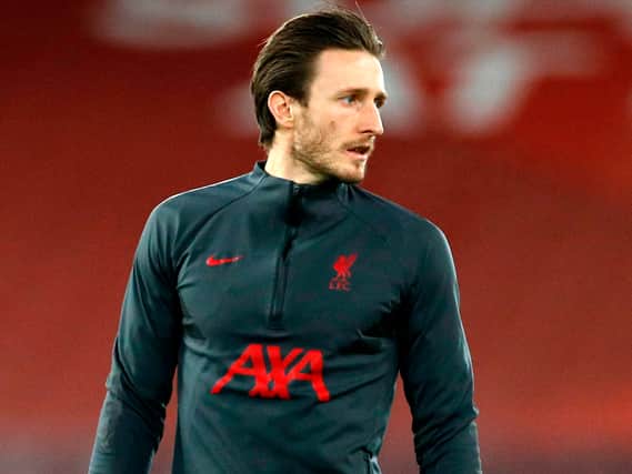 Ben Davies warms up for Liverpool. Picture: PHIL NOBLE/POOL/AFP via Getty Images