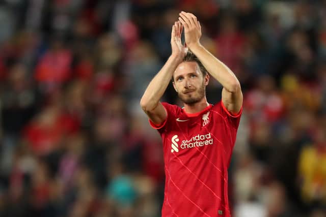 Ben Davies applauds the Anfield crowd after Liverpool’s pre-season friendly win over Osasuna earlier this month. Picture: Lewis Storey/ Getty Imagess