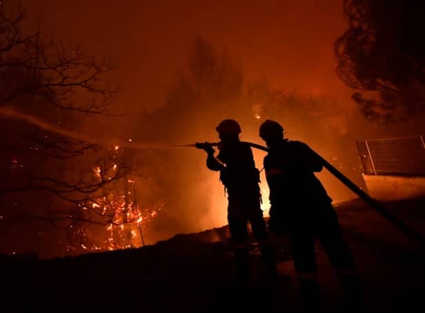 <p>UK  firefighters battle a blaze in Greece. Photo: National Fire Chiefs Council</p>