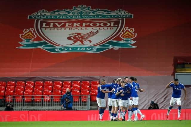 Everton celebrate scoring in their 2-0 win at Anfield last season. Picture: Phil Noble - Pool/Getty Images