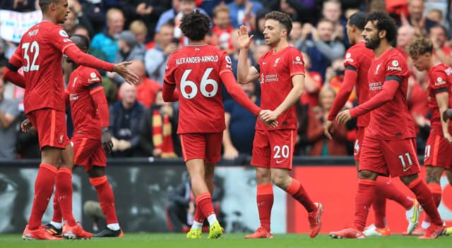 Liverpool celebrate Diogo Jota’s opening goal against Burnley. Picture: LINDSEY PARNABY/AFP via Getty Images)