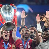 Andy Robertson lifts the Champions League trophy aloft following Liverpool’s triumph over Tottenham in 2019. Picture: Michael Regan/Getty Images