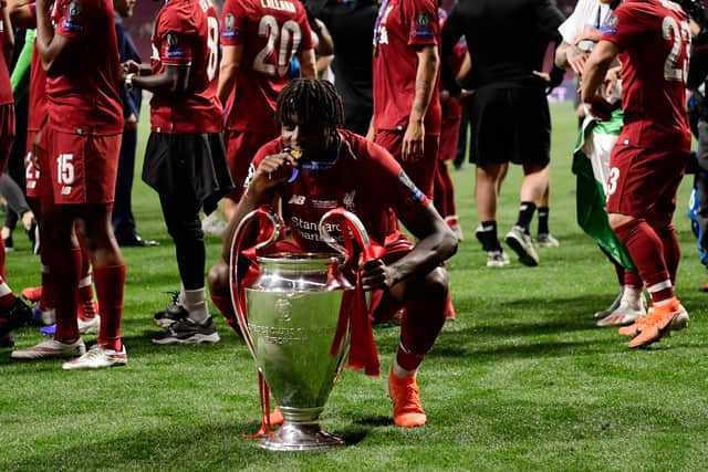 Divock Origi celebrates after Liverpool’s Champions League triumph over Tottenham. Picture: JAVIER SORIANO/AFP via Getty Images