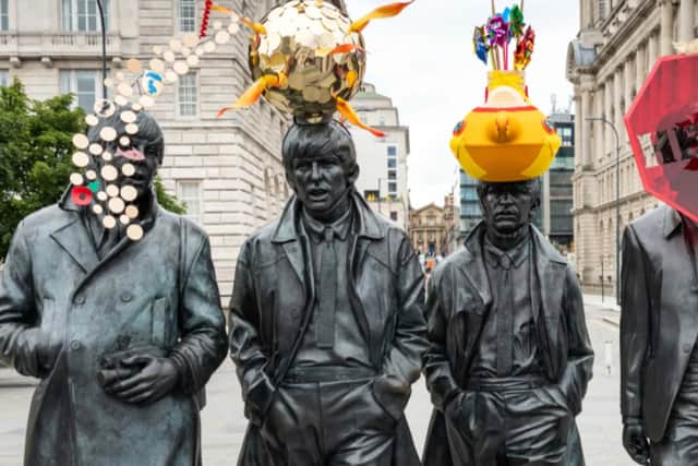 Hats of to The Beatles - Part of the Statues Redressed project. Photo: StatuesRedressed
