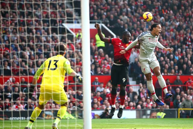 Virgil van Dijk and Romelu Lukaku battle for the ball during Liverpool’s trip to Manchester United in February 2019. Picture: Clive Brunskill/Getty Images