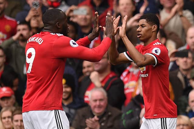 Romelu Lukaku celebrates with Marcus Rashford during Man Utd’s 2-1 defeat of Liverpool in March 2018. Picture: OLI SCARFF/AFP via Getty Images