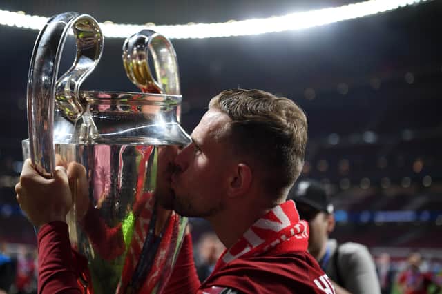 Jordan Henderson celebrates Liverpool’s Champions League triumph in 2019. Picture:  Matthias Hangst/Getty Images