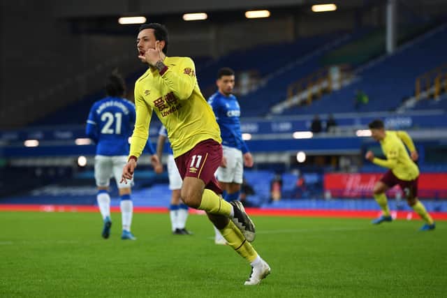 Dwight McNeil celebrates scoring for Burnley against Everton last season. Picturee: Gareth Copley/Getty Images
