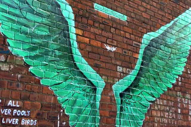 The small white crown hovers between the Liver Bird wings. Image: Paul Curtis Artwork