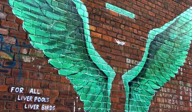 The small white crown hovers between the Liver Bird wings. Image: Paul Curtis Artwork