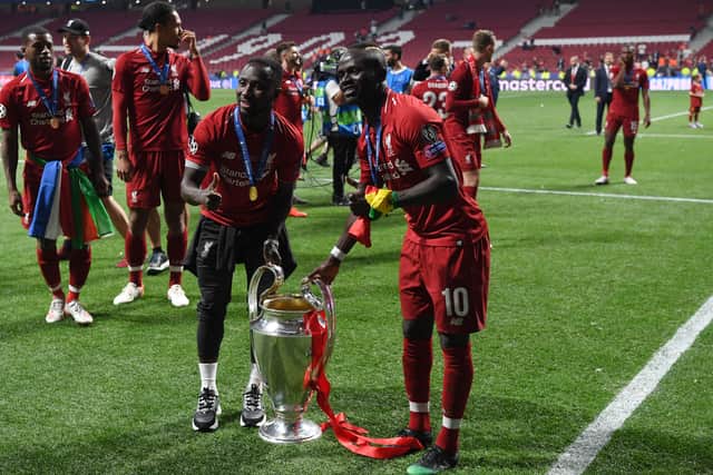 Naby Keita celebrates Liverpool’s Champions League triumph in 2019 with Sadio Mane. Picture: PAUL ELLIS/AFP via Getty Images
