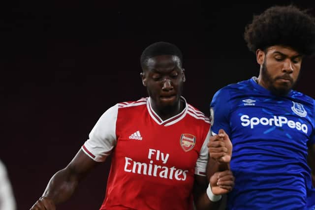 LONDON, ENGLAND - AUGUST 23: Joseph Olowu of Arsenal battles for possession with Ellis Simms of Everton during the Premier League 2 match between Arsenal and Everton at Emirates Stadium on August 23, 2019 in London, England. (Photo by Harriet Lander/Getty Images)