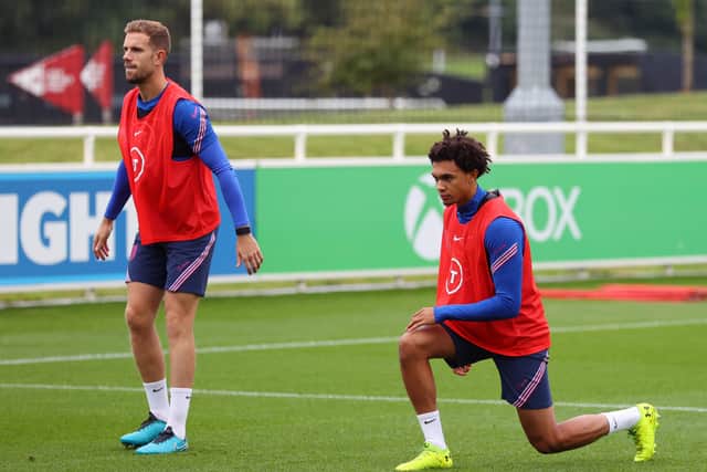Jordan Henderson and Trent Alexander-Arnold during Liverpool training. Picture: Catherine Ivill/Getty Images