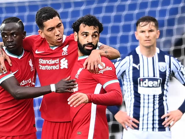 Liverpool forwards from left: Sadio Mane, Roberto firmino and Mo Salah. Picture: Laurence Griffiths/Getty Image