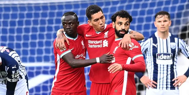<p>Liverpool forwards from left: Sadio Mane, Roberto firmino and Mo Salah. Picture: Laurence Griffiths/Getty Image</p>