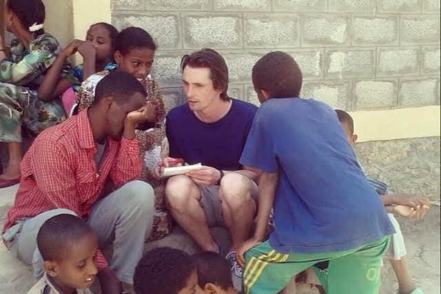 David Swanston with children in Ethiopia. Photo: David Swanston 