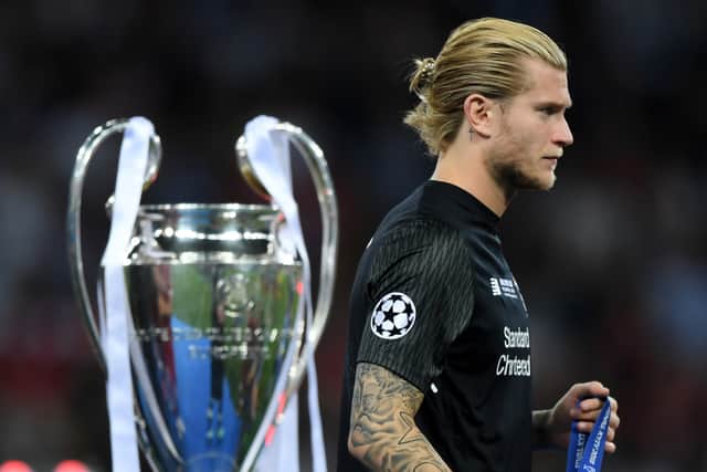 Loris Karius walks past the Champions League trophy after Liverpool’s defeat to Real Madrid in 2018. Picture: Shaun Botterill/Getty Images 