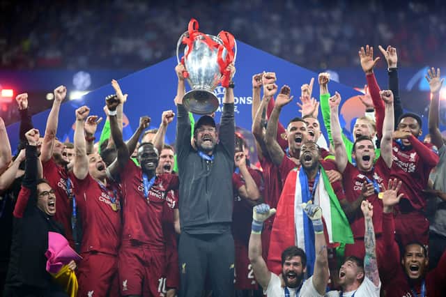 Jurgen Klopp hoists the Champions League trophy aloft. Picture: Michael Regan/Getty Images