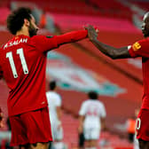 Mohamed Salah and Sadio Mane celebrate a Liverpool goal at Anfield 