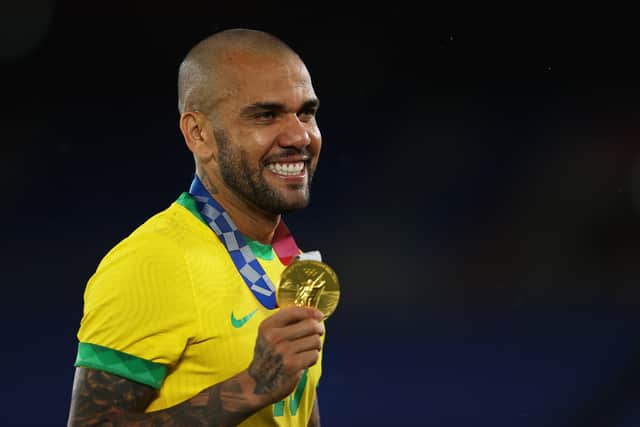 Dani Alves celebrates after helping Brazil claim Olympic gold in Tokyo. Picture: Francois Nel/Getty Images
