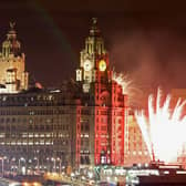 Fireworks go off near the Liver Building. Photo: Christopher Furlong/Getty Images