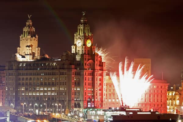 Fireworks go off near the Liver Building. Photo: Christopher Furlong/Getty Images