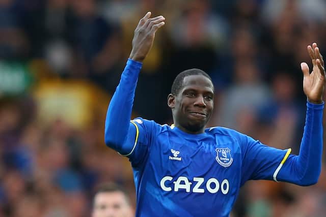 Abdoulaye Doucoure celebrates with Everton fans sat in the Park End after scoring against Norwich. Picture; Alex Livesey/Getty Images