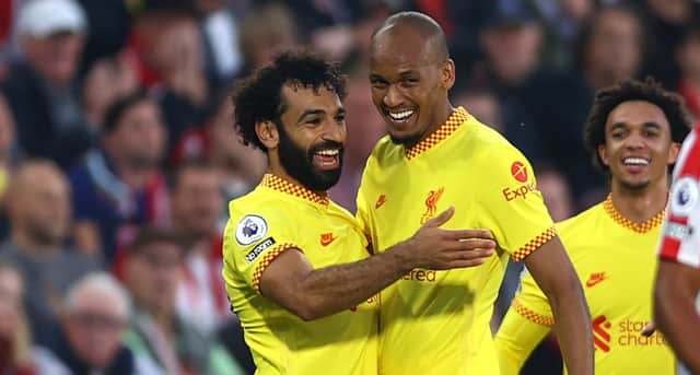 Mo Salah celebrates scoring for Liverpool against Brentford with team-mate Fabinho. Picture: Clive Rose/Getty Images
