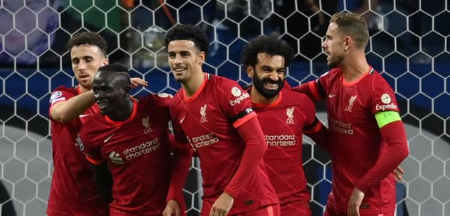 Liverpool celebrate Mo Salah’s opener against Porto. Picture: David Ramos/Getty Images
