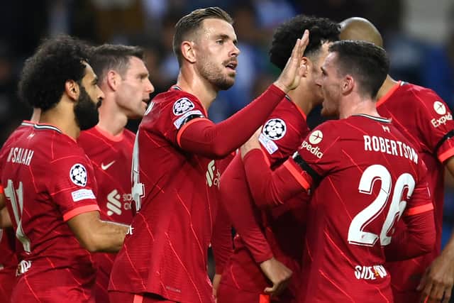 Jordan Henderson celebrates Liverpool’s third goal against Porto. Picture: David Ramos/Getty Images