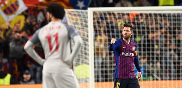 Lionel Messi celebrates scoring for Barcelona in front of Liverpool’s Mo Salah in May 2019. Picture: JOSEP LAGO/AFP via Getty Images
