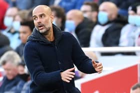 A member of Pep Guardiola’s Man City backroom team was allegedly spat at during the 2-2 draw against Liverpool. Picture: Michael Regan/Getty Images