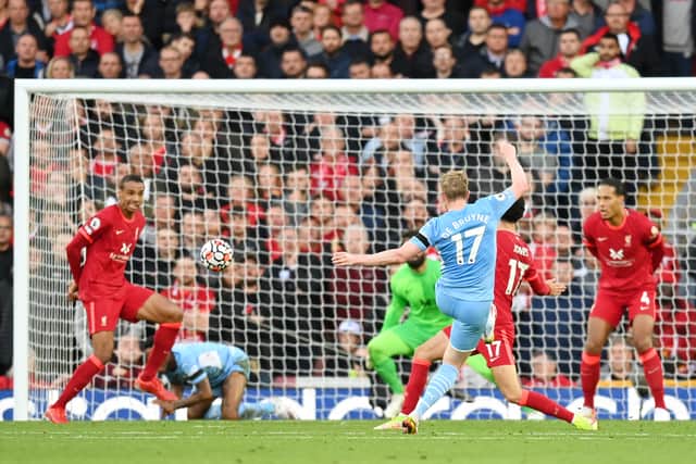 Kevin De Bruyne scores against Liverpool. Credit: Getty.