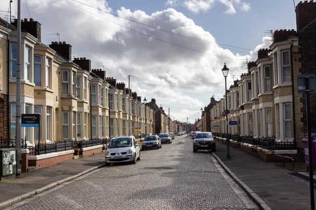 Liverpool / UK - February 29 2020: Terraced houses and cobbled street, Adelaide Road, Liverpool.