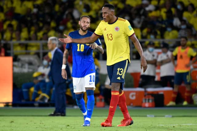Yerry Mina argues with Neymar during Colombia’s goalless draw against Brazil. Picture: Guillermo Legaria/Getty Images