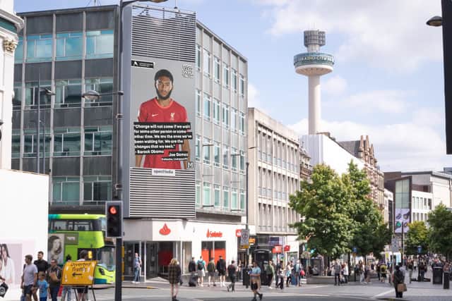 Liverpool footballer Joe Gomez features on a campaign advertising board in the city. 
