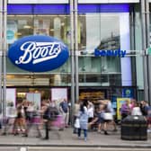 Members of the public walk past a branch of Boots the chemist (Pic from Getty)