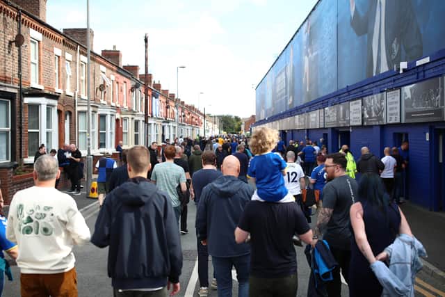 A view of fans outside the stadium prior to the Premier League match between Everton and Norwich City at Goodison Park on September 25, 2021 in Liverpool, England. (Photo by Jan Kruger/Getty Images)