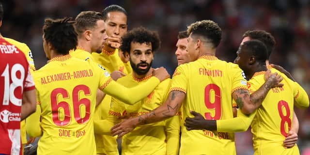 Liverpool celebrate Mo Salah’s opening goal at Atletico Madrid. Picture: David Ramos/Getty Images
