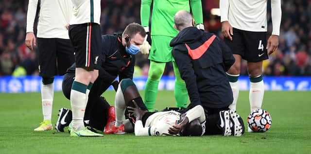 Naby Keita receives treatment. Picture: Michael Regan/Getty Images