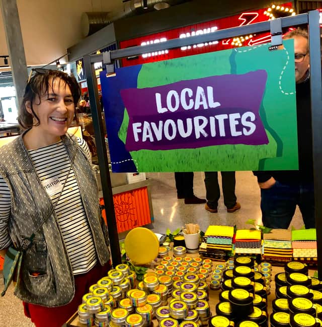 <p>Andrea Ku next to her range of products at the Morrisons supermarket in Kirkby. (Pic from Andrea Ku)</p>