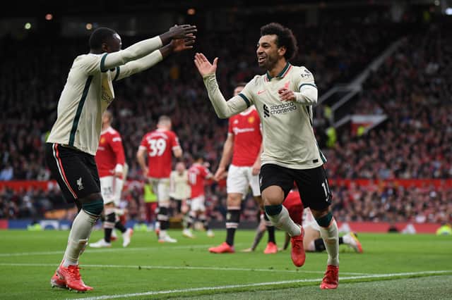 <p>Mohamed Salah celebrates scoring on his goals against Manchester United. </p>