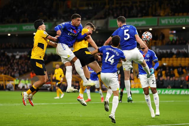Max Kilman of Wolverhamton Wanderers scores their team's first goal during the Premier League match between Wolverhampton Wanderers and Everton at Molineux on November 01, 2021 in Wolverhampton, England. (Photo by Catherine Ivill/Getty Images)