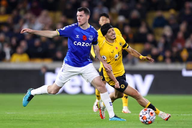 Michael Keane battles Raul Jiminez for the ball. Picture: Naomi Baker/Getty Images