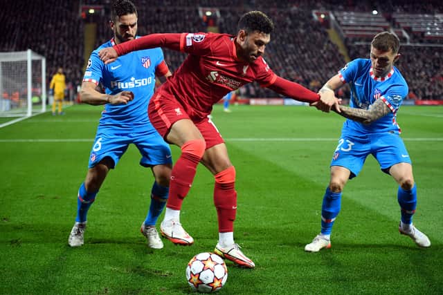 Alex Oxlade-Chamberlain on the ball in Liverpool’s defeat of Atletico Madrid. Picture: OLI SCARFF/AFP via Getty Images